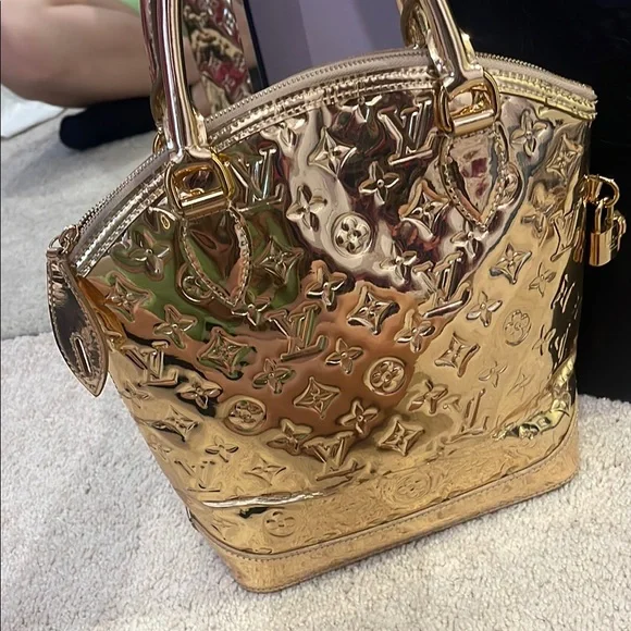 Louis Vuitton Gold Shoulder Bag with Iconic Monogram
